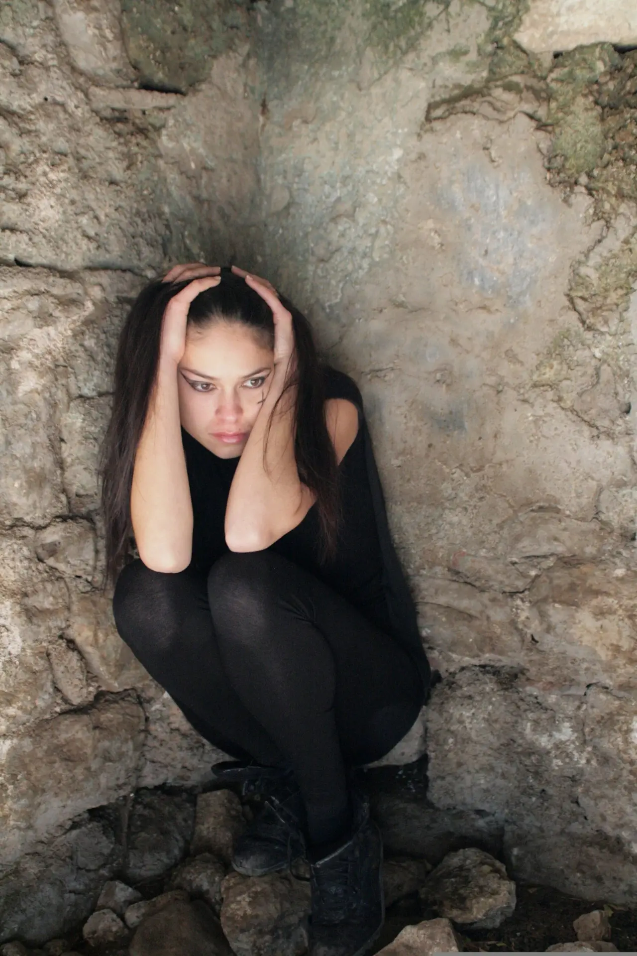 Girl holding her head in frustration